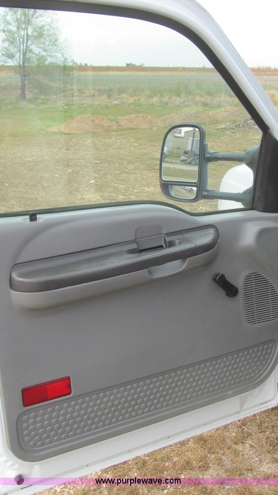 image for item G5684 2004 Ford F350 Crew Cab flatbed truck