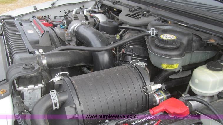 image for item G5684 2004 Ford F350 Crew Cab flatbed truck