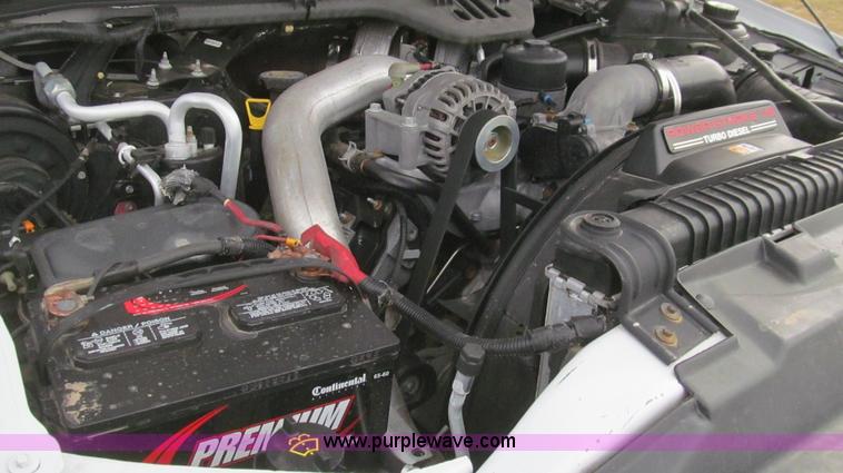 image for item G5684 2004 Ford F350 Crew Cab flatbed truck