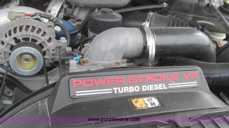 image for item G5684 2004 Ford F350 Crew Cab flatbed truck