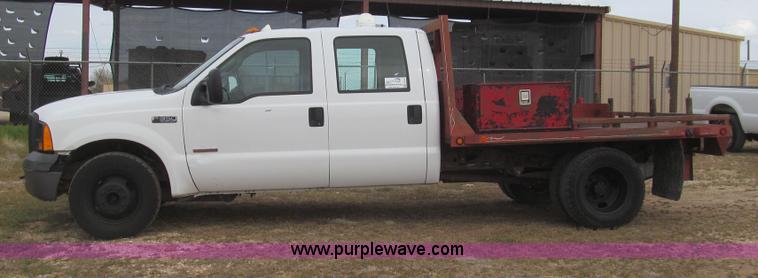 image for item G5685 2006 Ford F350 Crew Cab flatbed truck