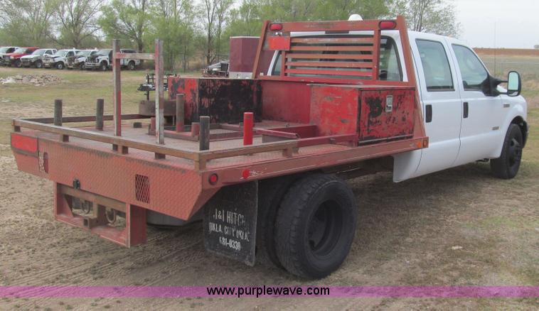 image for item G5685 2006 Ford F350 Crew Cab flatbed truck