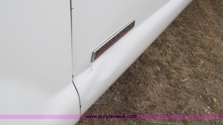 image for item G5685 2006 Ford F350 Crew Cab flatbed truck