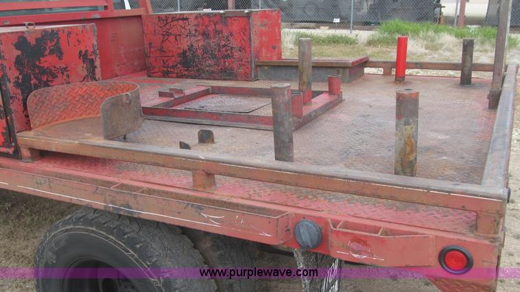 image for item G5685 2006 Ford F350 Crew Cab flatbed truck