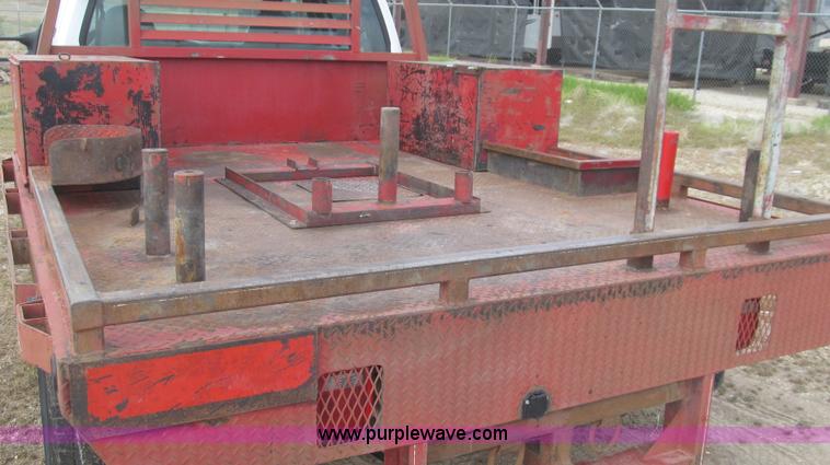 image for item G5685 2006 Ford F350 Crew Cab flatbed truck