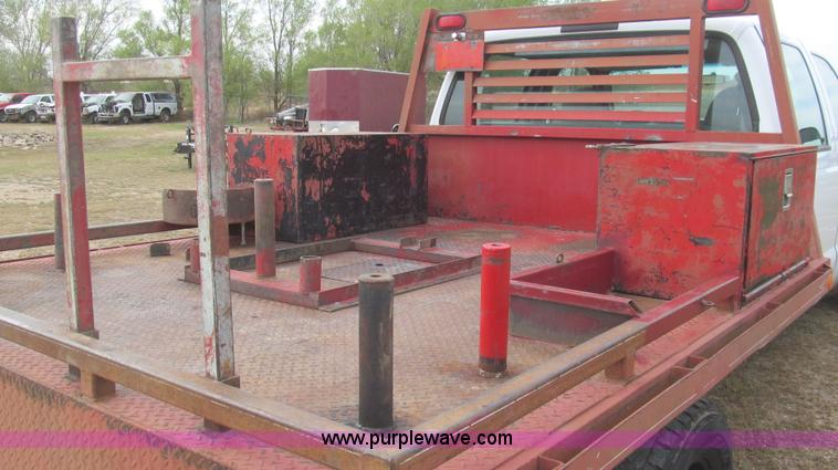 image for item G5685 2006 Ford F350 Crew Cab flatbed truck