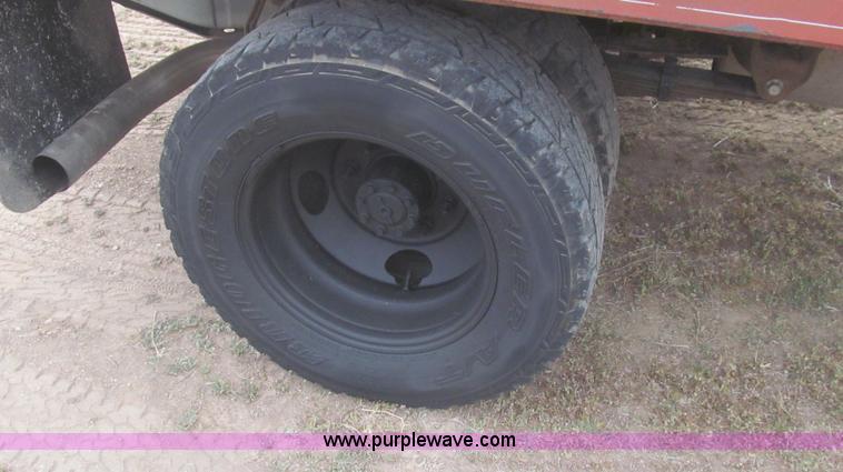 image for item G5685 2006 Ford F350 Crew Cab flatbed truck