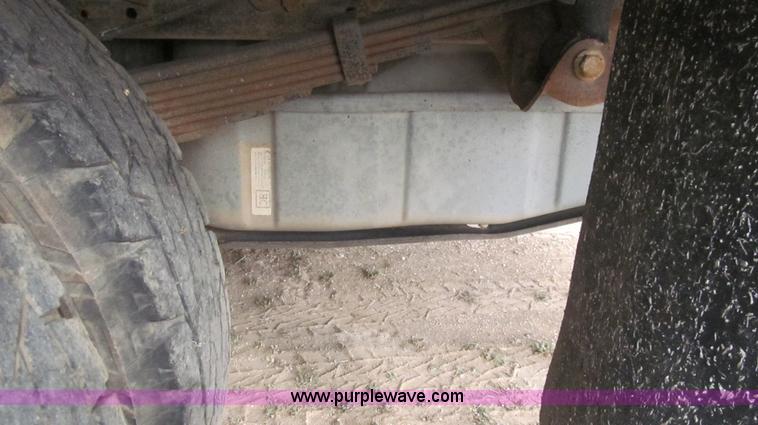 image for item G5685 2006 Ford F350 Crew Cab flatbed truck