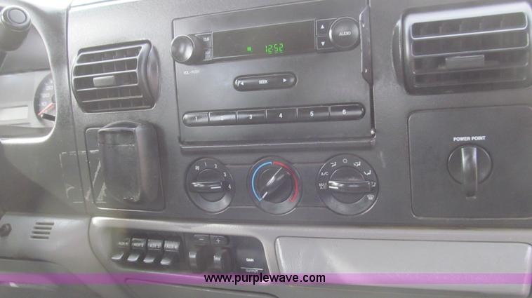 image for item G5685 2006 Ford F350 Crew Cab flatbed truck