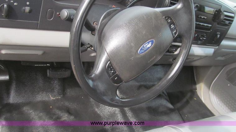 image for item G5685 2006 Ford F350 Crew Cab flatbed truck