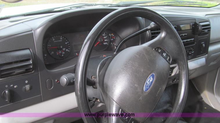 image for item G5685 2006 Ford F350 Crew Cab flatbed truck