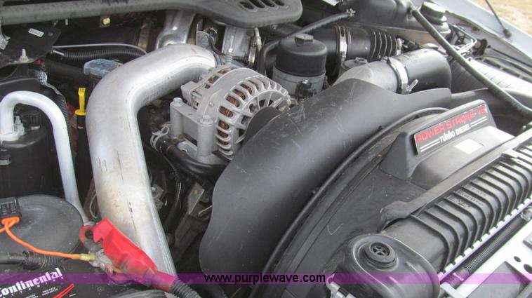 image for item G5685 2006 Ford F350 Crew Cab flatbed truck