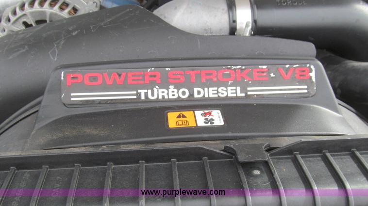 image for item G5685 2006 Ford F350 Crew Cab flatbed truck