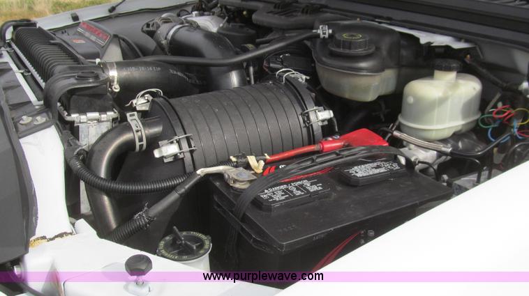 image for item G5685 2006 Ford F350 Crew Cab flatbed truck