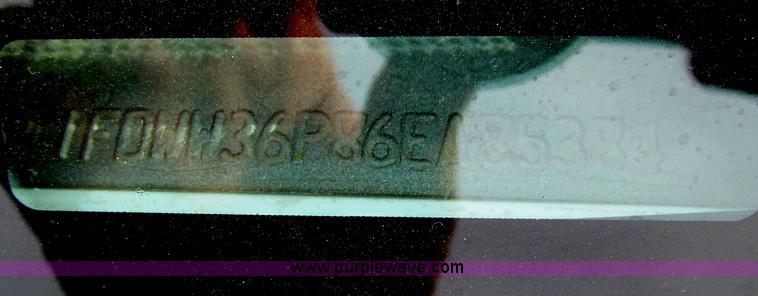 image for item G5685 2006 Ford F350 Crew Cab flatbed truck