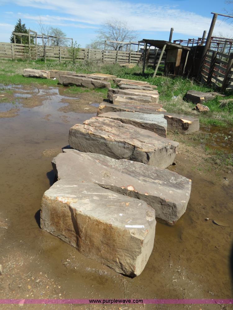 image for item S9590 Approximately 24 ton Beam Natural Stone moss landscaping boulders