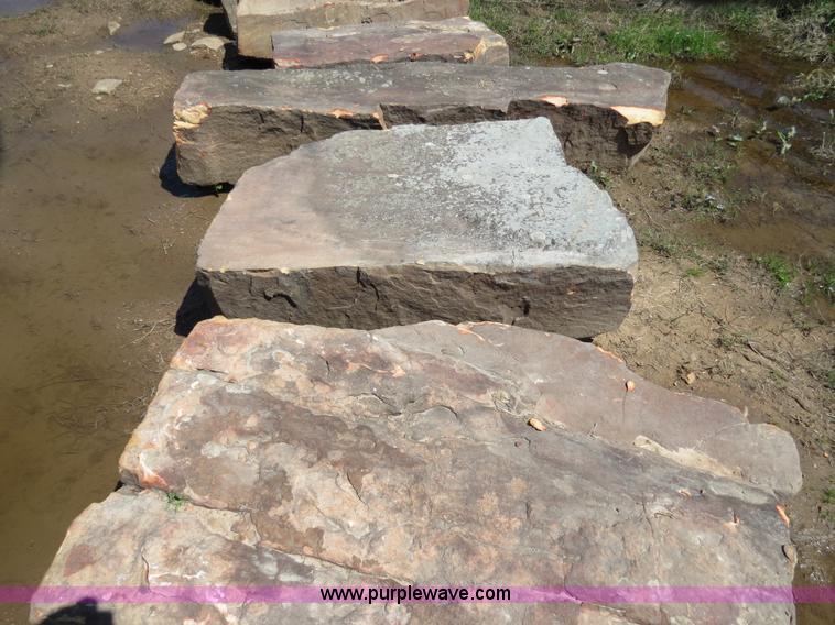 image for item S9634 Approximately 24 ton Beam Natural Stone moss landscaping boulders