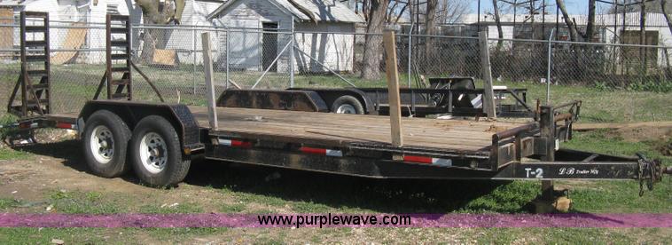image for item E3381 2004 LB tandem axle flatbed trailer
