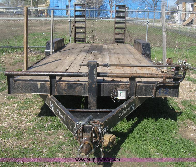 image for item E3381 2004 LB tandem axle flatbed trailer