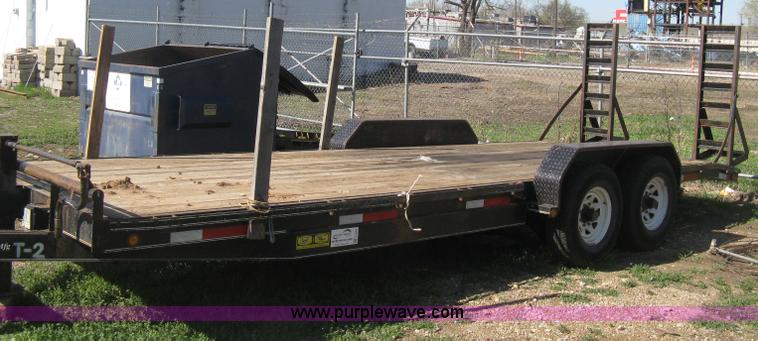 image for item E3381 2004 LB tandem axle flatbed trailer
