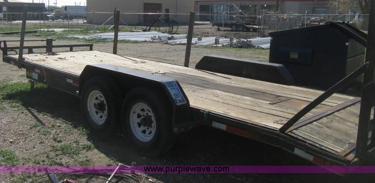 image for item E3381 2004 LB tandem axle flatbed trailer