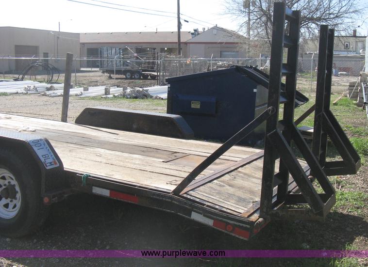 image for item E3381 2004 LB tandem axle flatbed trailer