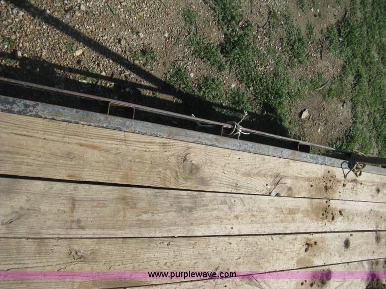 image for item E3381 2004 LB tandem axle flatbed trailer