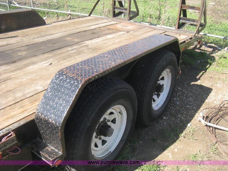 image for item E3381 2004 LB tandem axle flatbed trailer