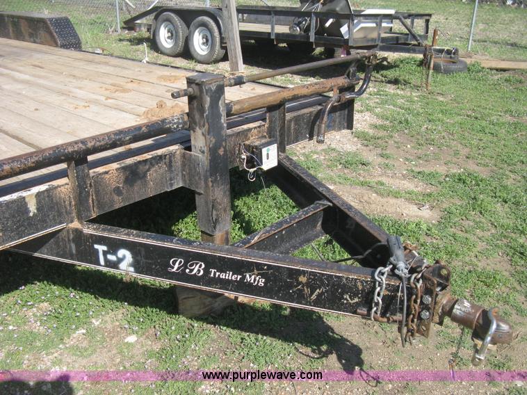 image for item E3381 2004 LB tandem axle flatbed trailer