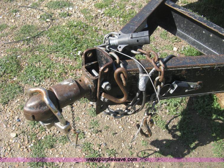 image for item E3381 2004 LB tandem axle flatbed trailer