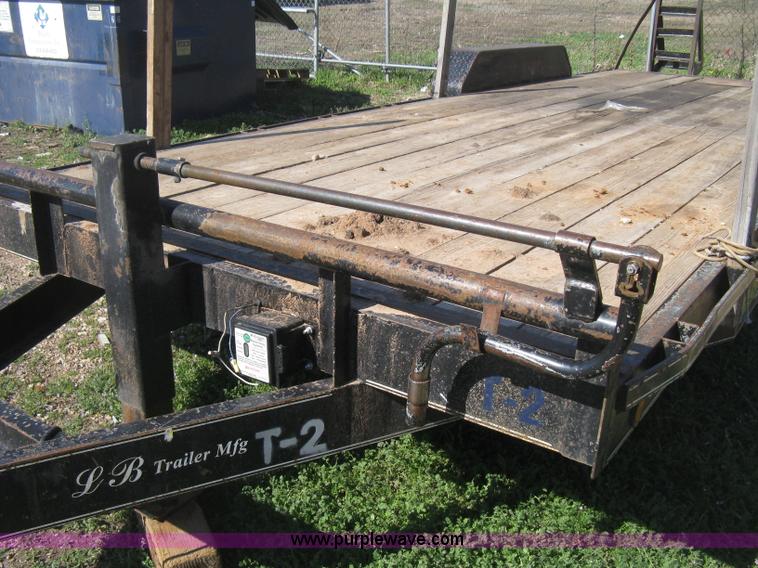 image for item E3381 2004 LB tandem axle flatbed trailer