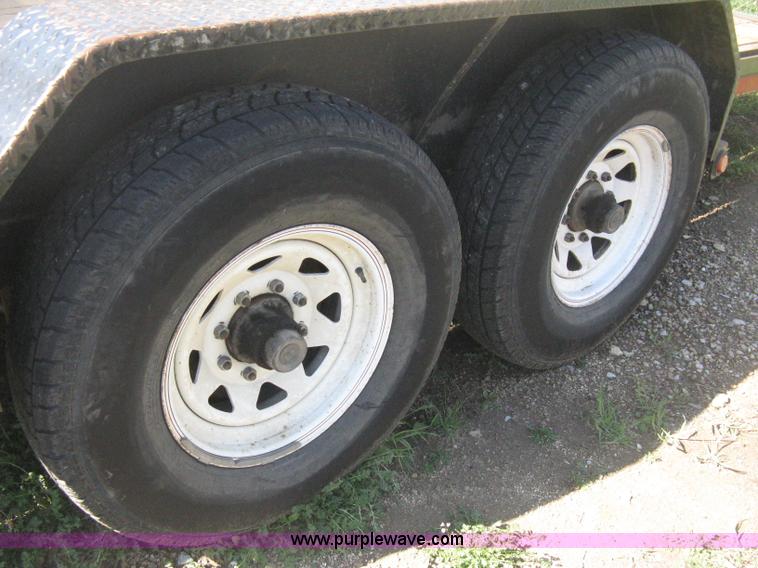image for item E3381 2004 LB tandem axle flatbed trailer
