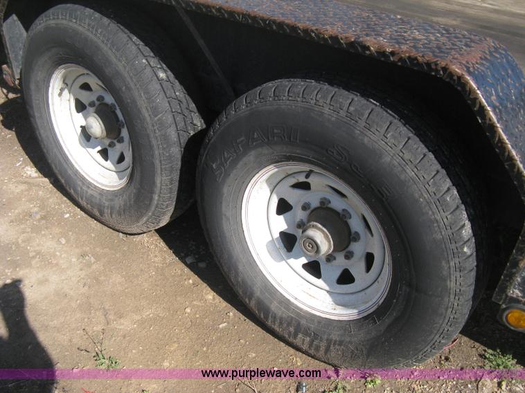 image for item E3381 2004 LB tandem axle flatbed trailer
