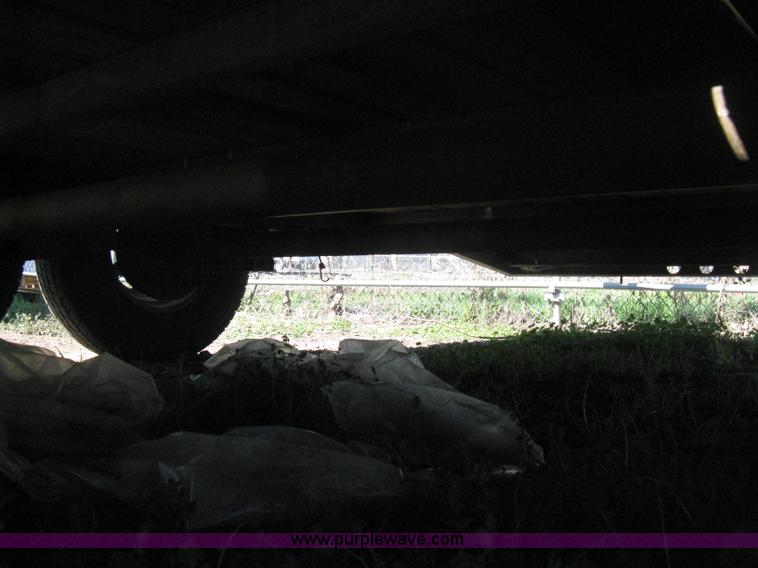 image for item E3381 2004 LB tandem axle flatbed trailer