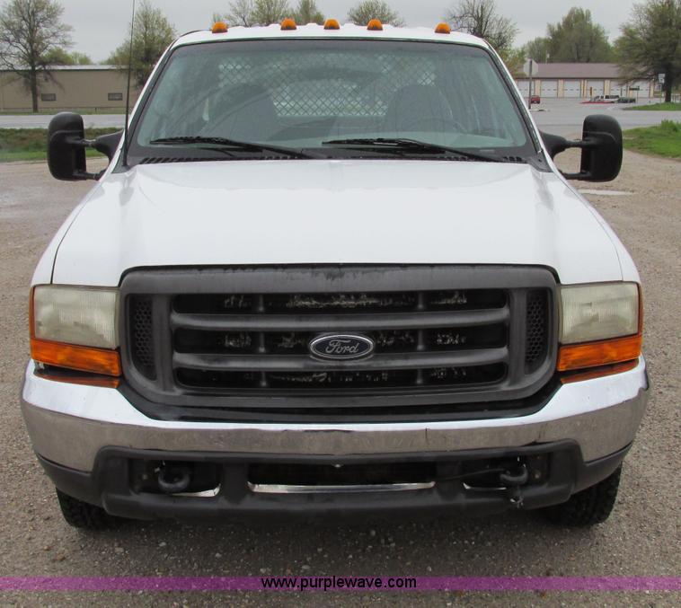 image for item F4825 2000 Ford F350 Super Duty Crew Cab flatbed pickup truck