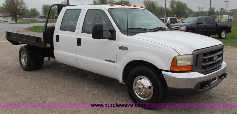 image for item F4825 2000 Ford F350 Super Duty Crew Cab flatbed pickup truck