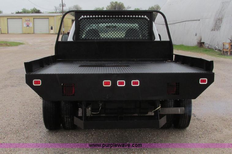image for item F4825 2000 Ford F350 Super Duty Crew Cab flatbed pickup truck