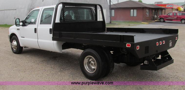 image for item F4825 2000 Ford F350 Super Duty Crew Cab flatbed pickup truck