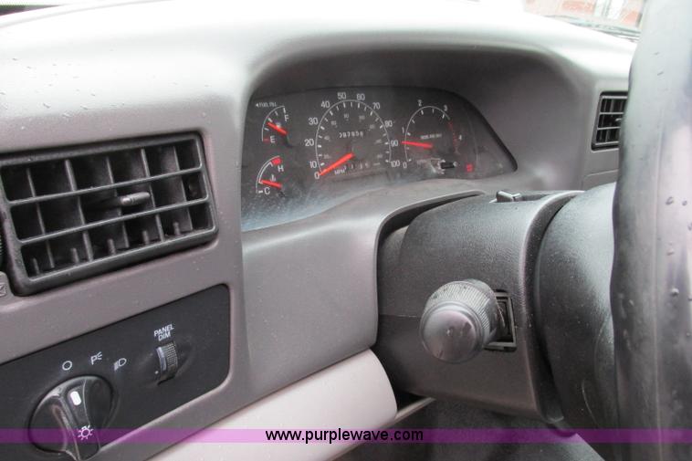 image for item F4825 2000 Ford F350 Super Duty Crew Cab flatbed pickup truck