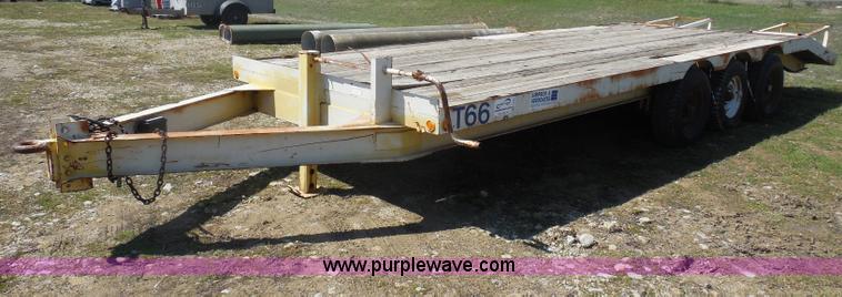 image for item H3243 1982 JFW 20' triple axle flatbed trailer