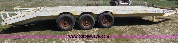 image for item H3243 1982 JFW 20' triple axle flatbed trailer