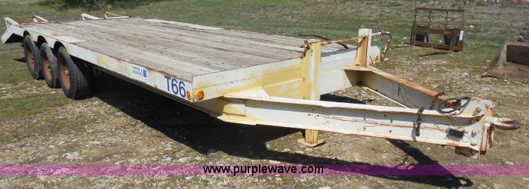 image for item H3243 1982 JFW 20' triple axle flatbed trailer