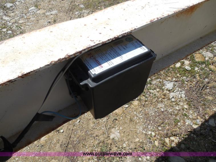 image for item H3243 1982 JFW 20' triple axle flatbed trailer