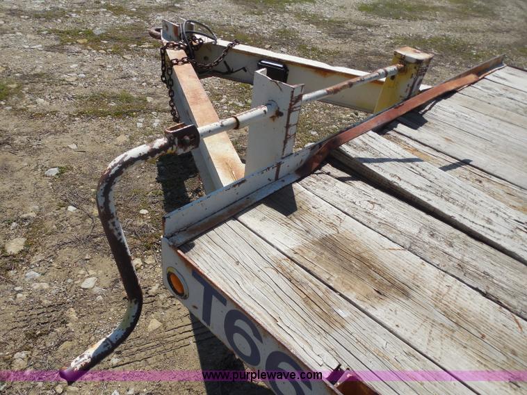 image for item H3243 1982 JFW 20' triple axle flatbed trailer