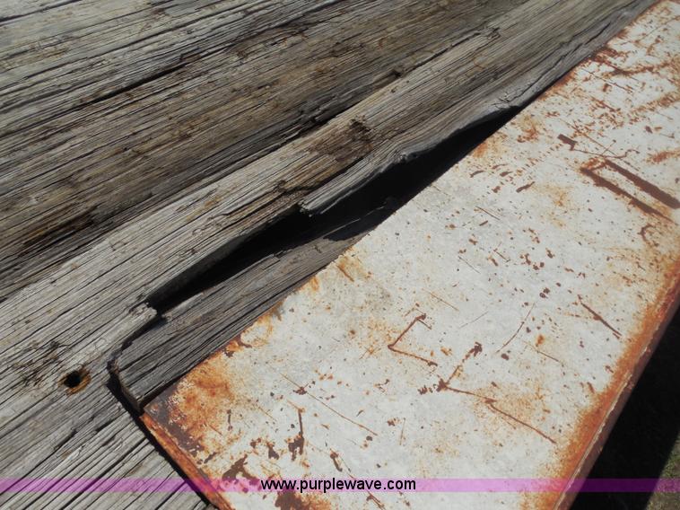 image for item H3243 1982 JFW 20' triple axle flatbed trailer