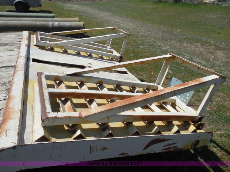 image for item H3243 1982 JFW 20' triple axle flatbed trailer