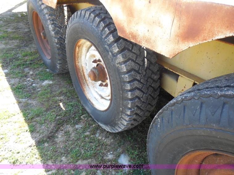 image for item H3243 1982 JFW 20' triple axle flatbed trailer