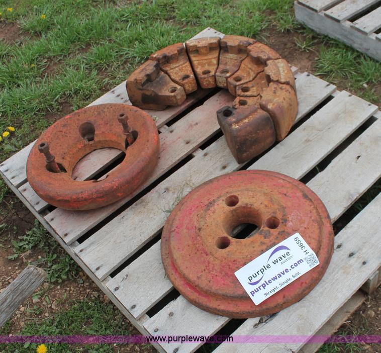 image for item H3659 Ford wheel weight set and Case hub set