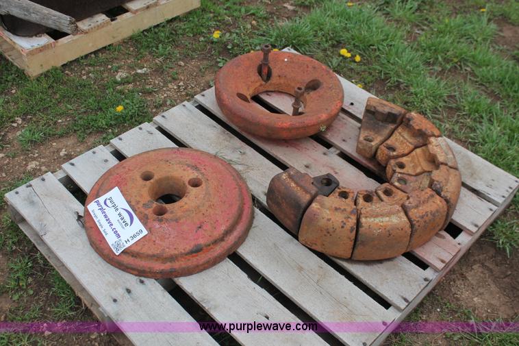 image for item H3659 Ford wheel weight set and Case hub set