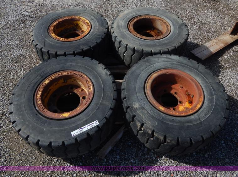 image for item V9914 (4) pneumatic 27 x 10-12 forklift tires